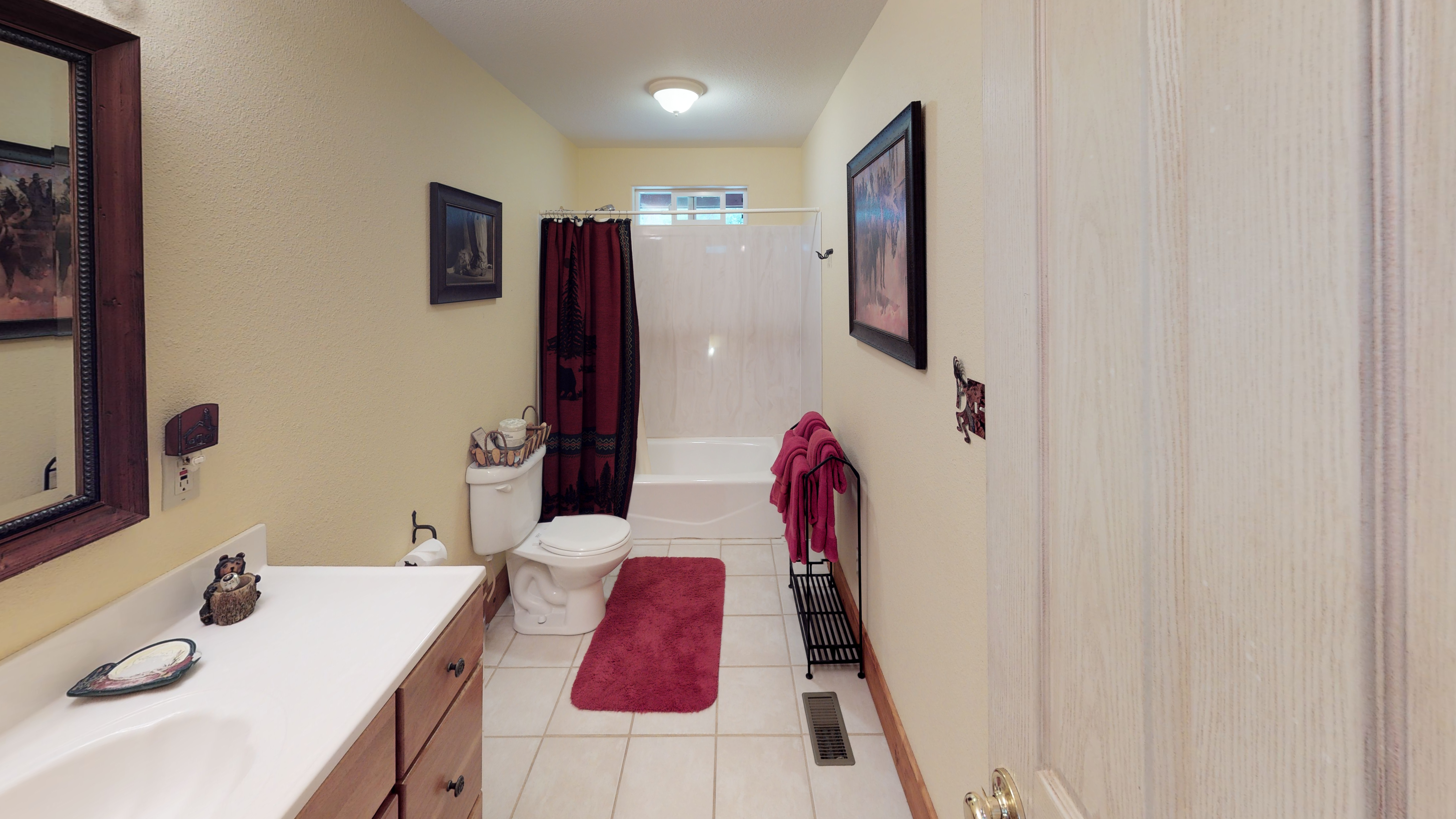 Clean, spacious bathroom with fluffy towels
