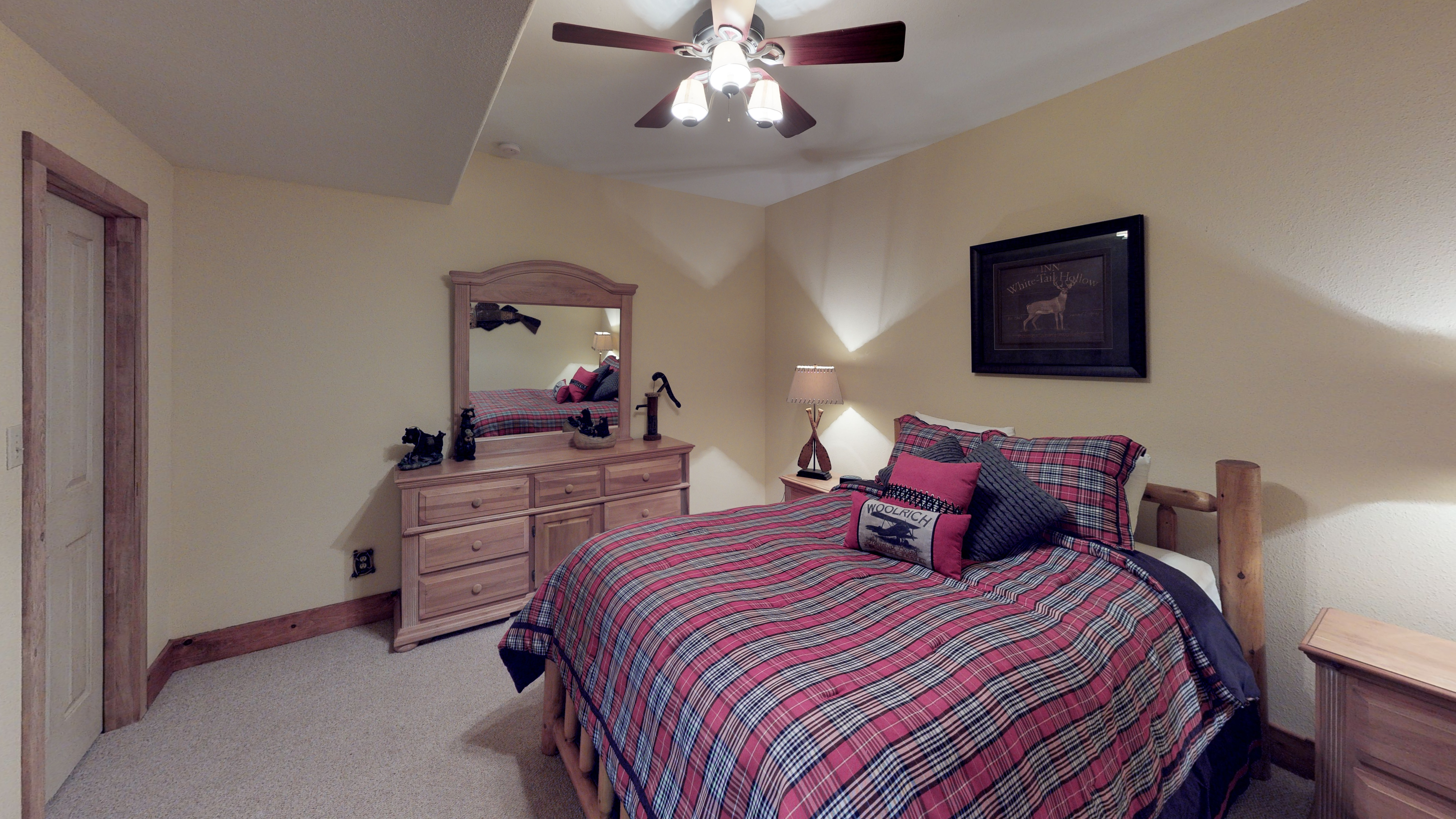 Comfortable king size bed and dresser with plenty of storage space
