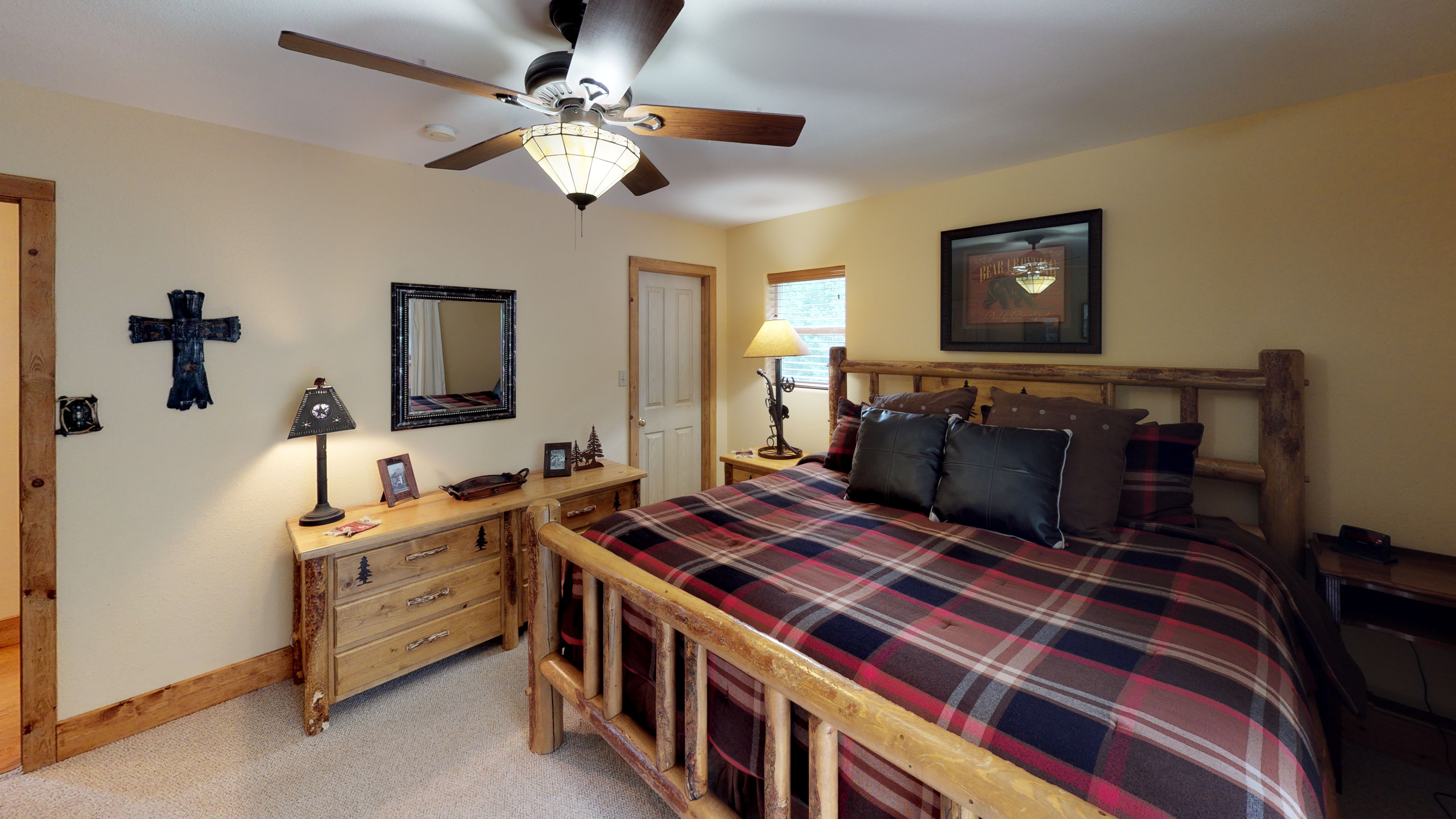 Comfortable king size bed with a beautiful wooden dresser